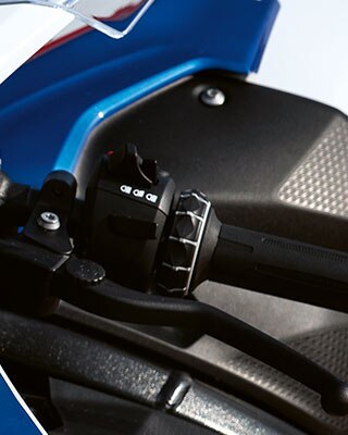 Viacúčelový ovládač na riadidlách BMW RR
